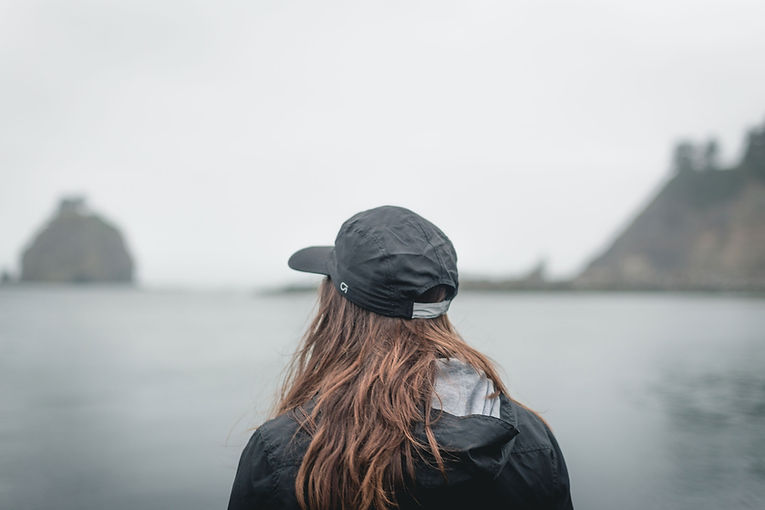 Woman Looking At Lake