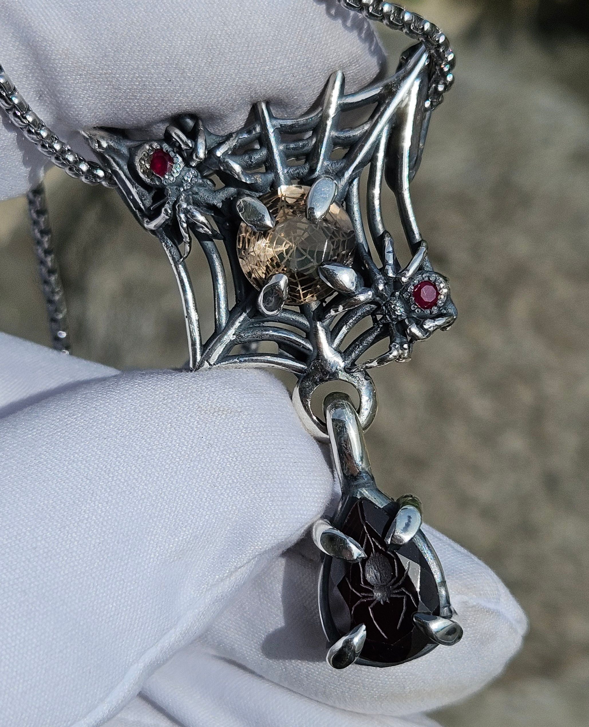 Weavers - Garnet, Smokey Quartz, Ruby pendant in .925 with spider carvings