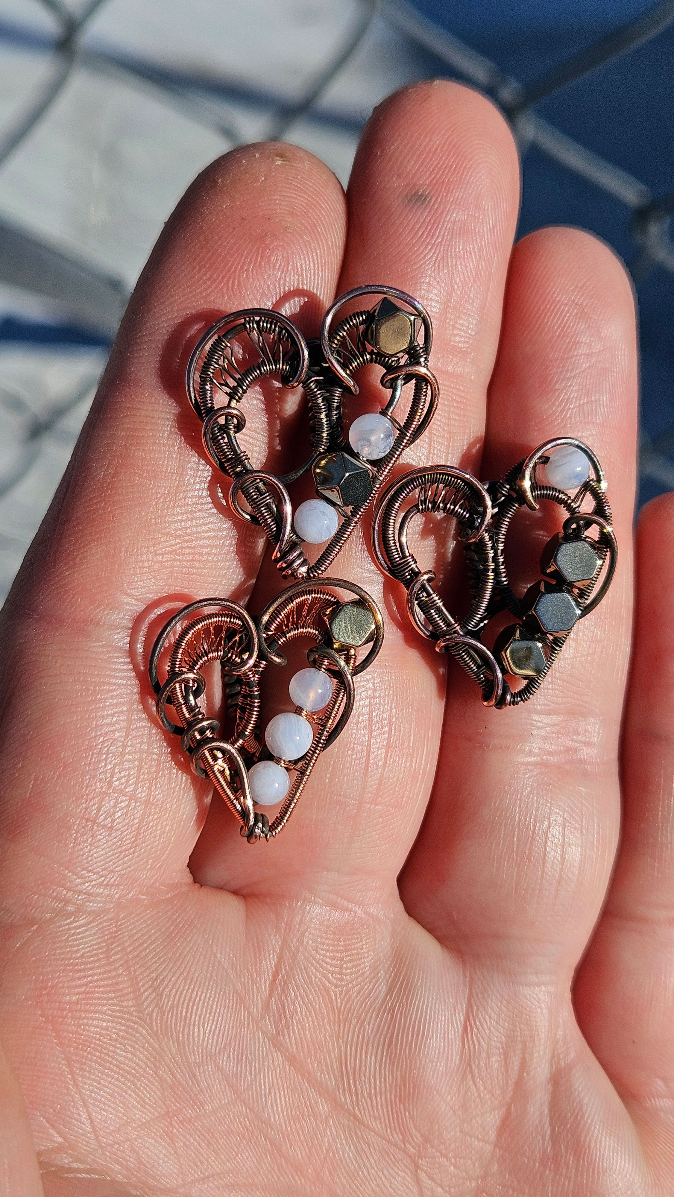Mixed stone Copper Hearts, Pyrite and Agate pendants.
