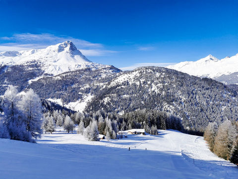 das Alpenblick - Skigebiet Nauders - Abfahrt Bergkastel und Blick ins schweizerische Engadin
