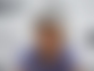 An image of Alex Eala speaking to the media at a press conference