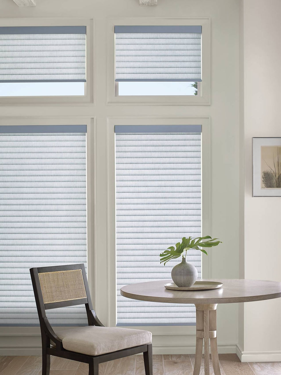 Hunter Douglas provides the most advanced remote control cellular roller shades near me to assist with managing temperature in this Parker CO kitchen installed by BCC of Denver Colorado.;