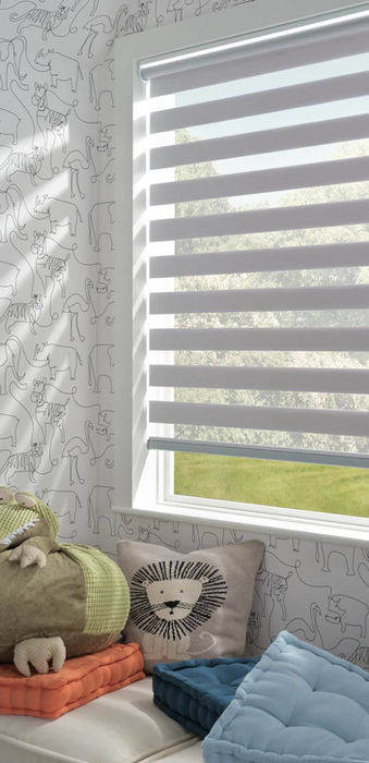 Motorized light filtering window treatments ensure the highest quality energy efficiency in this Parker CO master suite professionally fitted by BCC.;