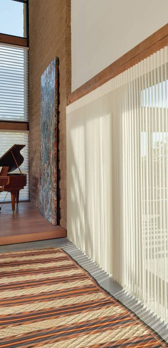 Leading remote control premium window coverings like these sheer panels offer the finest aesthetic for a Greenwood Village CO great room by BCC.;