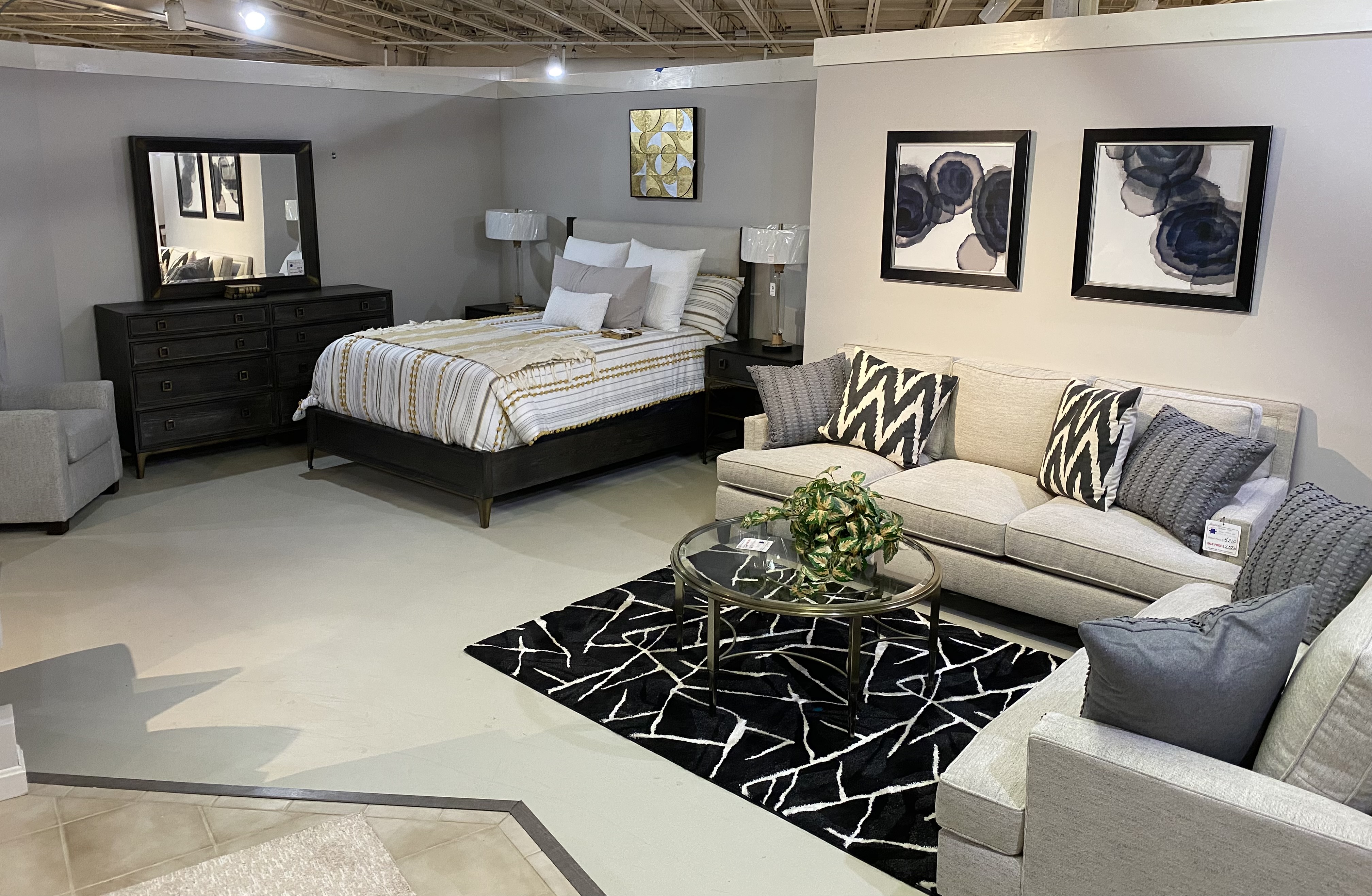 Whitco Home Furnishings showroom picture of couch and bed