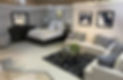 Whitco showroom with bed and living room set