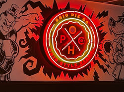 Neon sign with vinyl graphics