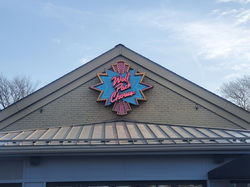 Custom marquee sign with neon channel letters, push-thrus & marquee bulbs