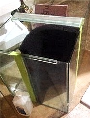 Corner HMF filter foam in position, held by two trim pieces that were secured with silicon