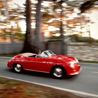 Classic car driving through Big Sur along Highway 1 following MPI Jet arrival.