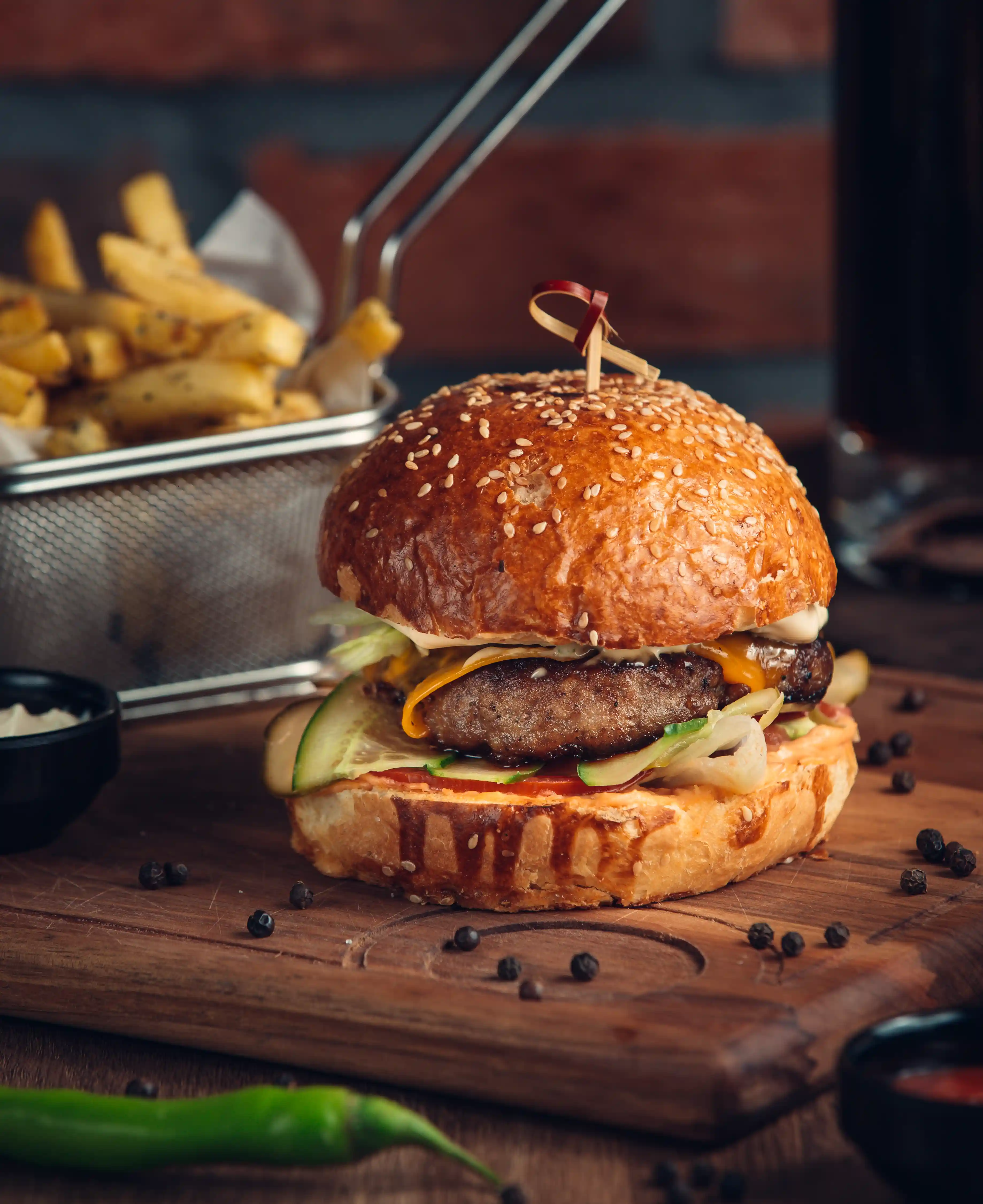 huge-burger-with-fried-meat-vegetables.webp