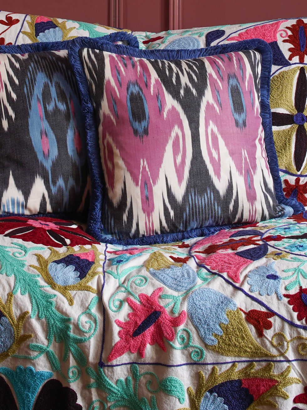 Thumbnail: Dark squared handmade vintage Ikat cushion with pink and soft blue pattern