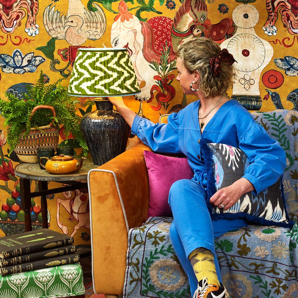Thumbnail: Maximalist interior design, handmade green silk ikat lampshade in patterned wallpapered sitting room