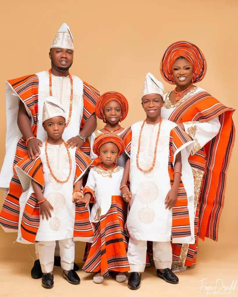 Family wearing traditional Asoebi