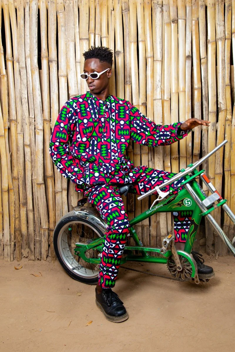 Young boy wearing Pink Samakaka cloth