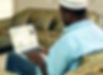 Student studying Qur’an and Arabic online on a laptop
