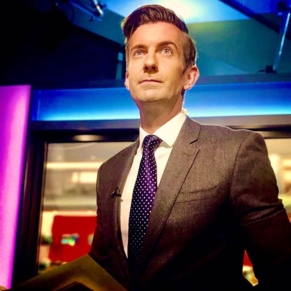 BBC Reporter Ben Thompson in our navy spot tie