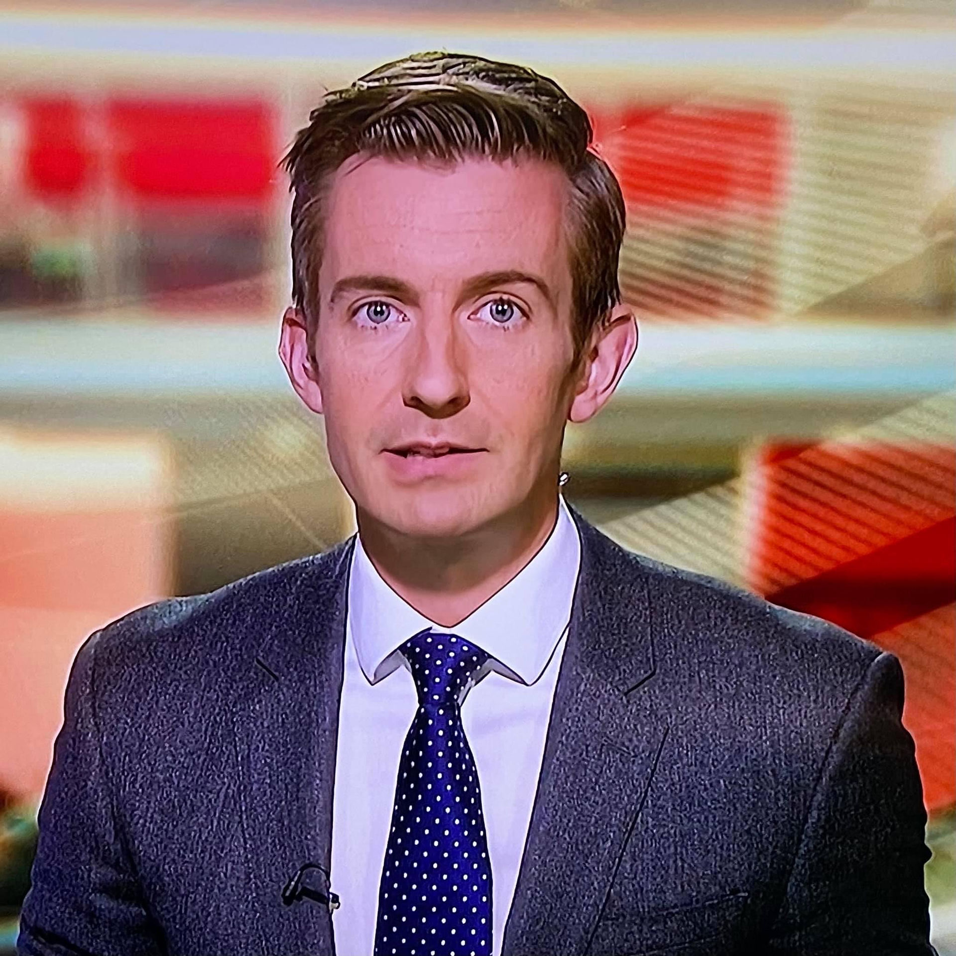 BBC Reporter Ben Thompson in our navy spot tie