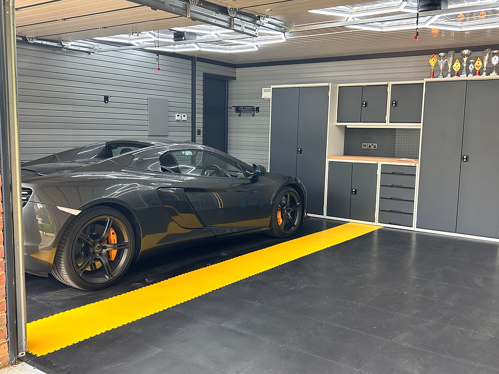 McLaren supercar in a luxury garage designed by The Modern Garage Company