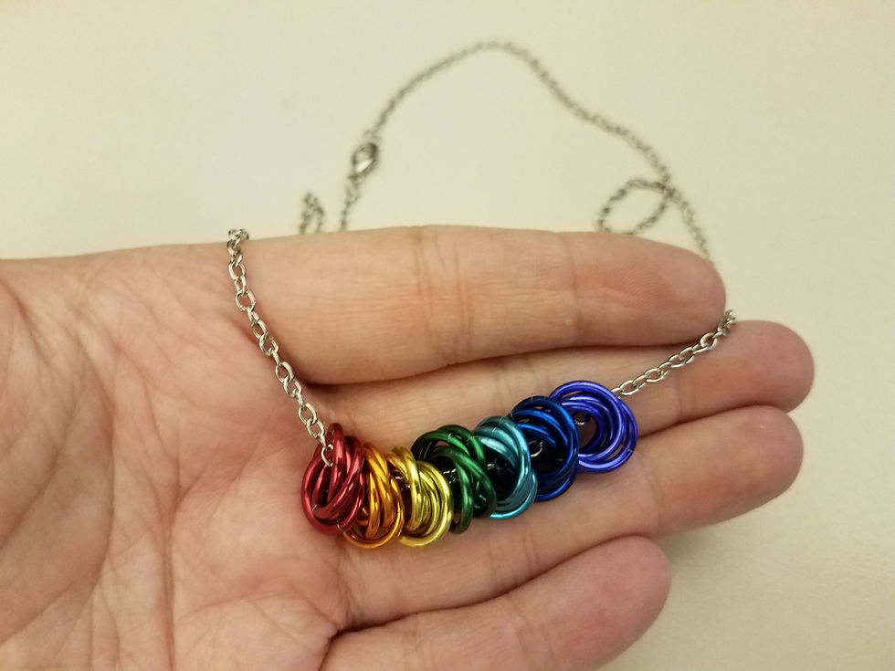 Thumbnail: Rainbow chainmail mobius rosette necklace