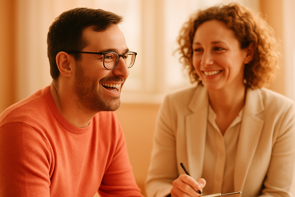 Smiling adult client and warm therapist facing each other in a sunlit therapy office during adhd and speech in adults interru