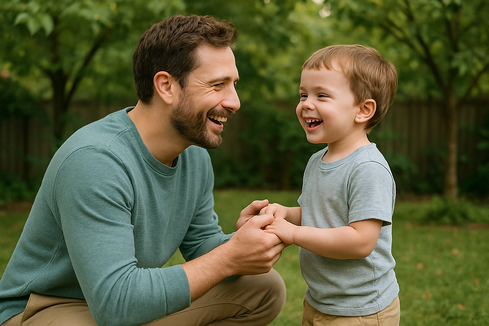 Father crouched down eye-level with his smiling child in a leafy backyard during songs for speech development