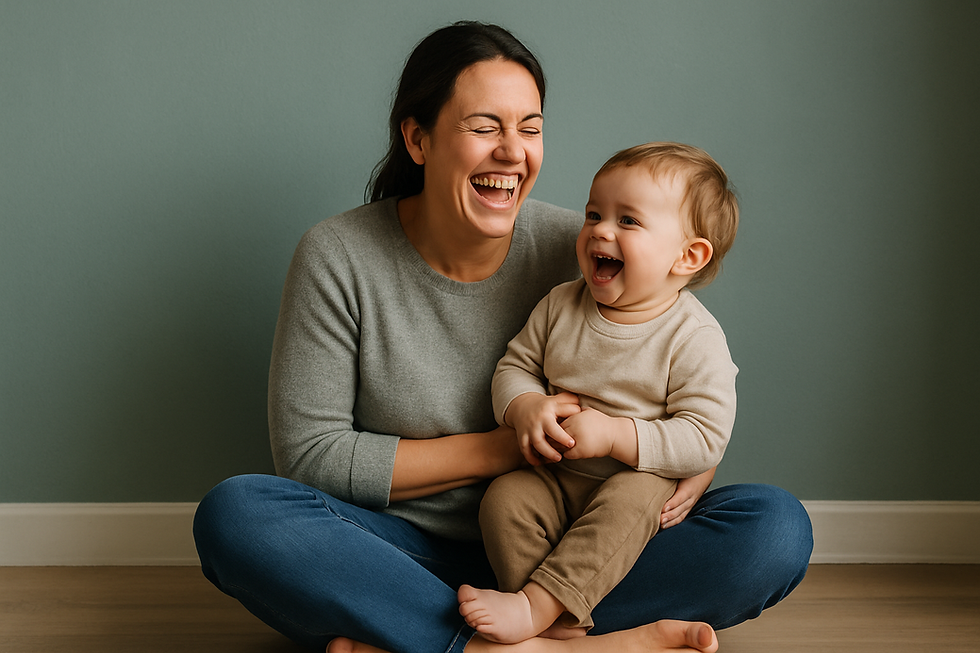Laughing mother sitting cross-legged on the floor playing with her giggling toddler during help no one understands