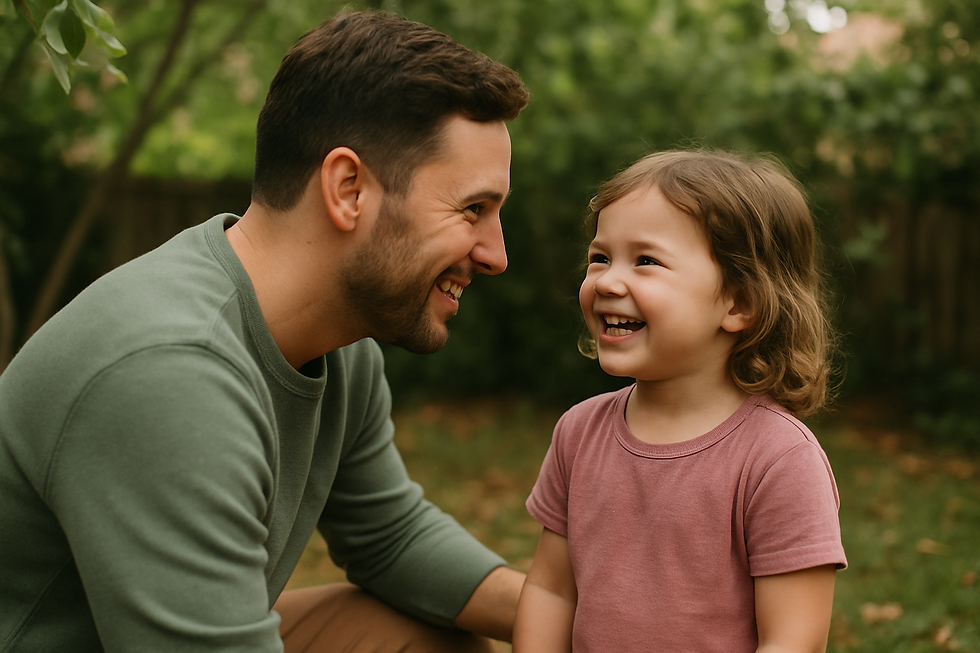 Father crouched down eye-level with his smiling child in a leafy backyard — Speech Therapy Frequency How Often Should Your Ch