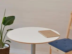 A laptop on the table. 