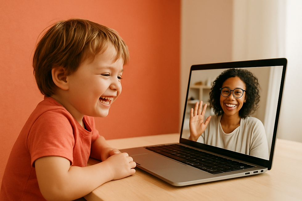 Young child grinning at a laptop screen showing a friendly therapist waving back during hoarse voice causes