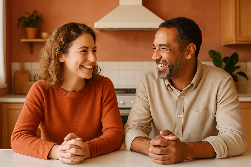 Happy adult couple practicing communication together on a bright kitchen bench — Voice Therapy for Teachers: Protect Your Mos