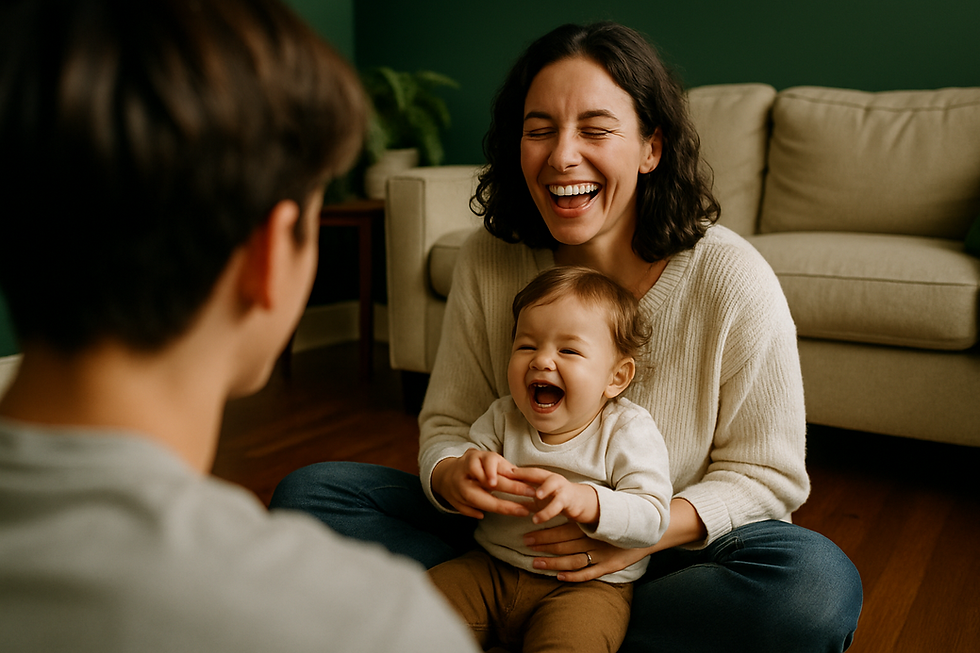 Laughing mother sitting cross-legged on the floor playing with her giggling toddler during communication skills for teens