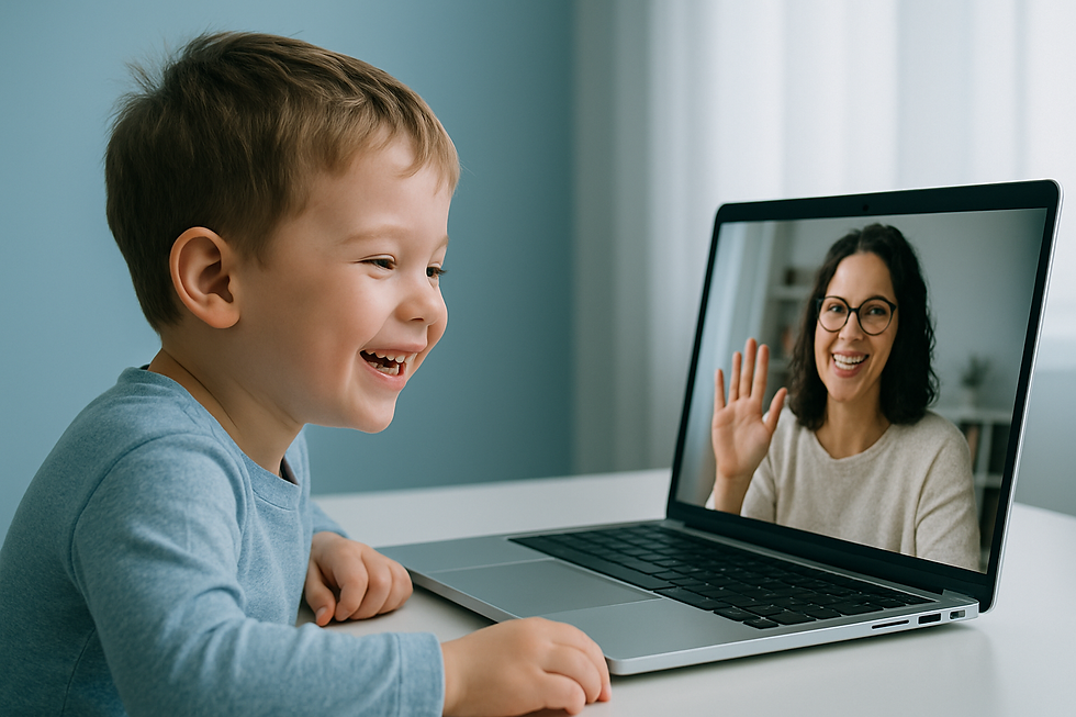 Young child grinning at a laptop screen showing a friendly therapist waving back — Speech Therapy Frequency How Often Should