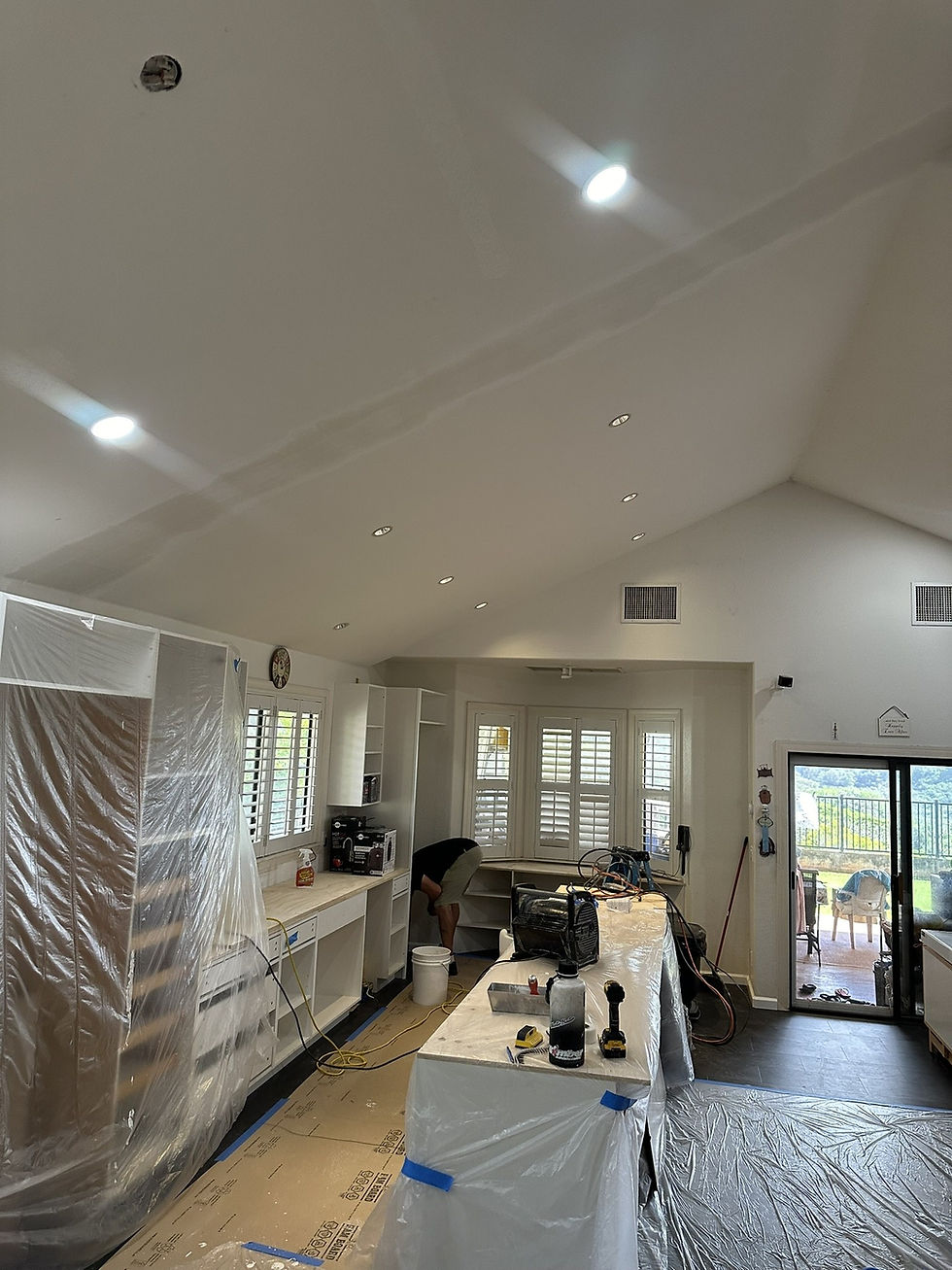 Finished drywall ceiling and walls in open room