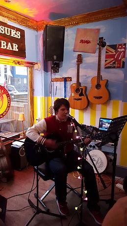 Performer at a bar