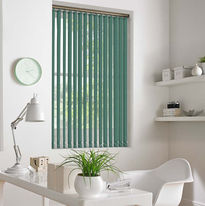 Green vertical blinds over large window