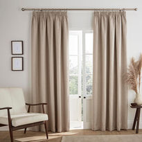 Beige ring ready-made curtains on a gold rail