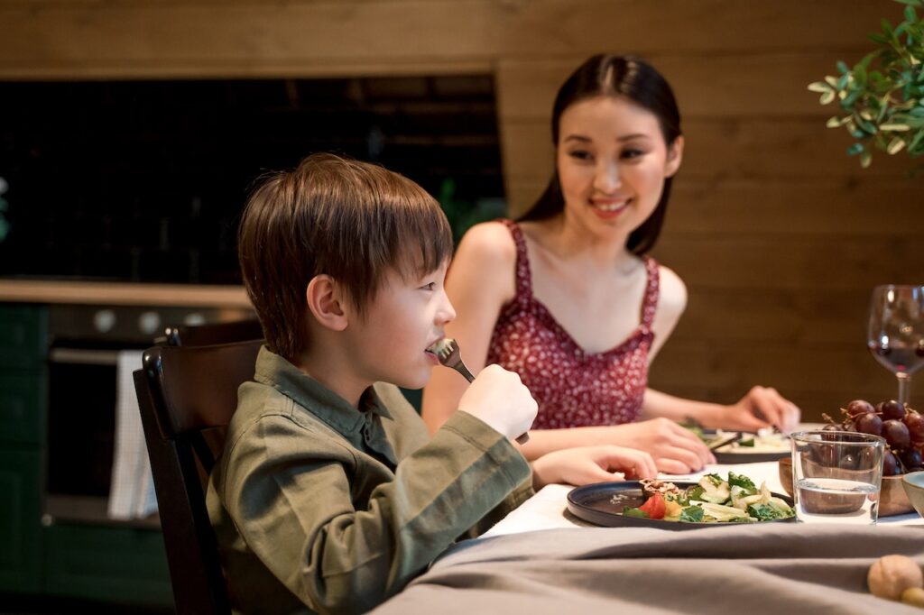 child eating healthy food
