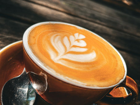 A perfectly brewed specialty coffee at Full Circle in Ghent, showcasing expertly crafted espresso in a cosy plant-based coffee bar opposite Ghent-Sint-Pieters station.