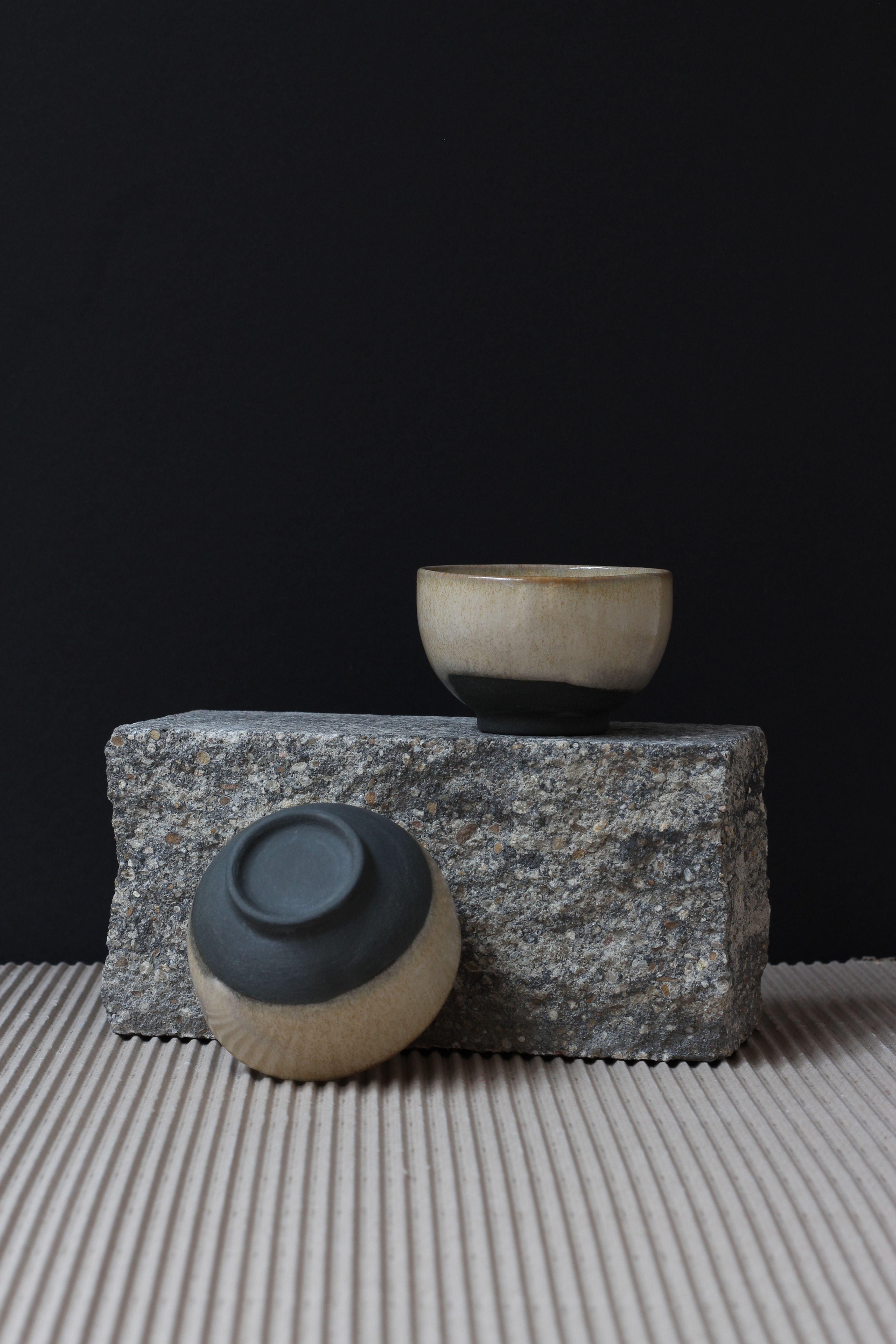 HANDMADE STONEWARE JAPAN CUP CREAM BLACK BOTTOM