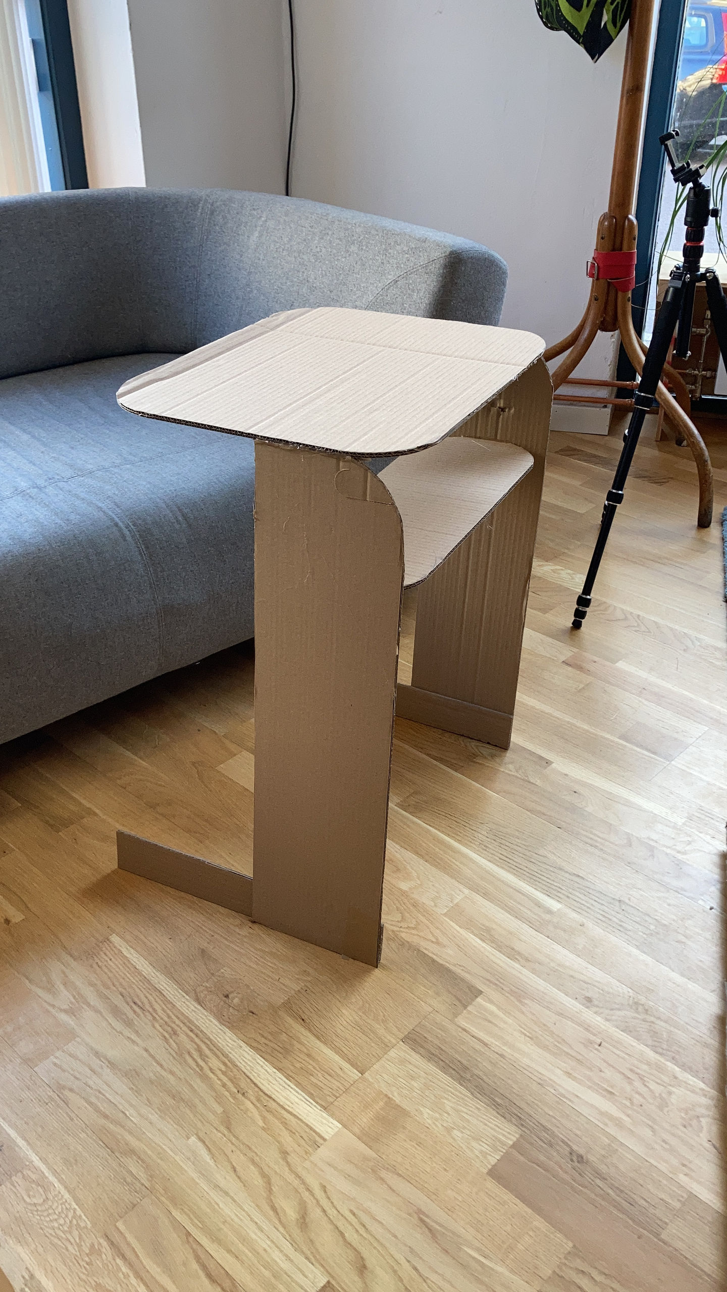 Olseröd mockup—a minimalist side table with clean lines, designed by Gustav. Scandinavian-inspired, featuring a light-colored finish, sleek silhouette, and functional elegance. Perfect for modern interiors, living spaces, and brands seeking timeless design.