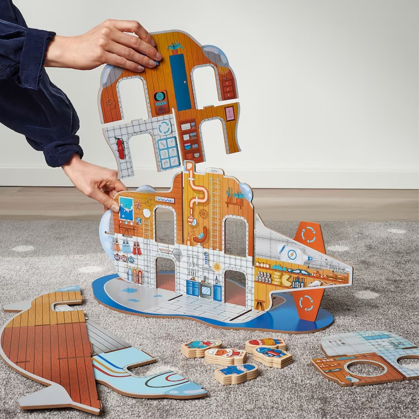 Blåvingad project interactive model by designer Gustav Carlberg—a hands-on 3D submarine puzzle, intricately designed with detailed illustrations of the interior compartments, control panels, and structural elements, fostering immersive assembly and exploration.