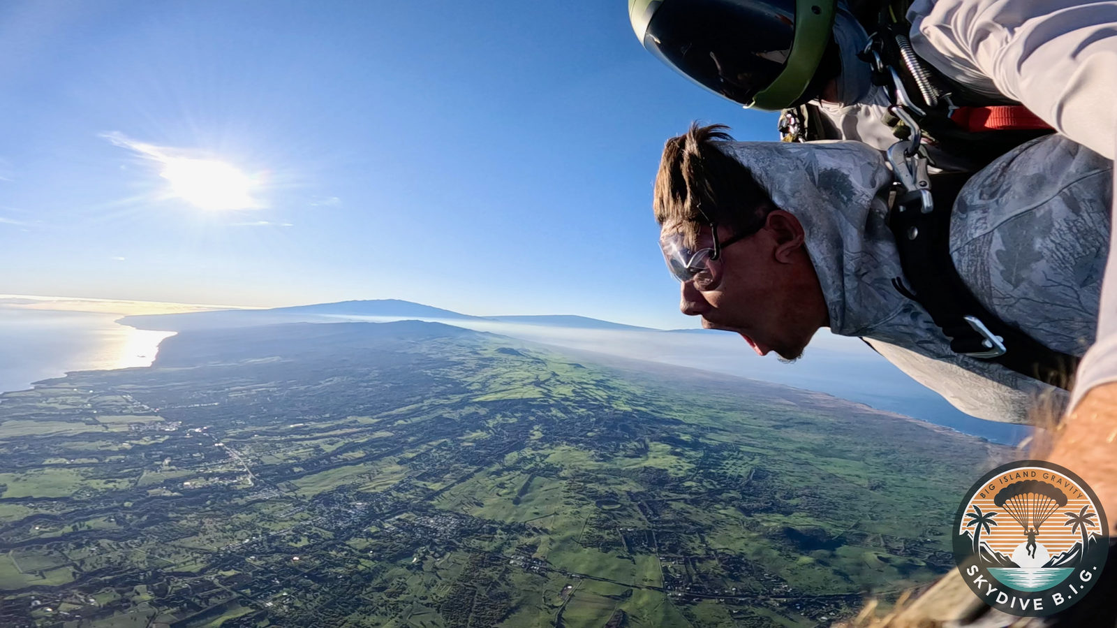 Freefall with the Kohala coastline below