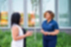 Tina Gilbert meeting with a client to discuss leadership development and organizational goals