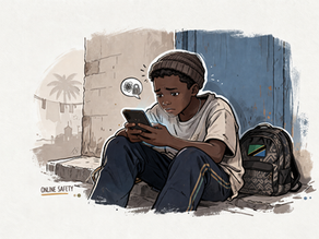 A young 14 year old boy looking at his phone looking sad.
