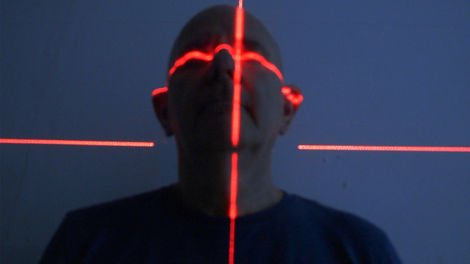 Minimalist wall drawing of a hand and vein, with a thin red line. High contrast, accessible for colorblind viewers.

