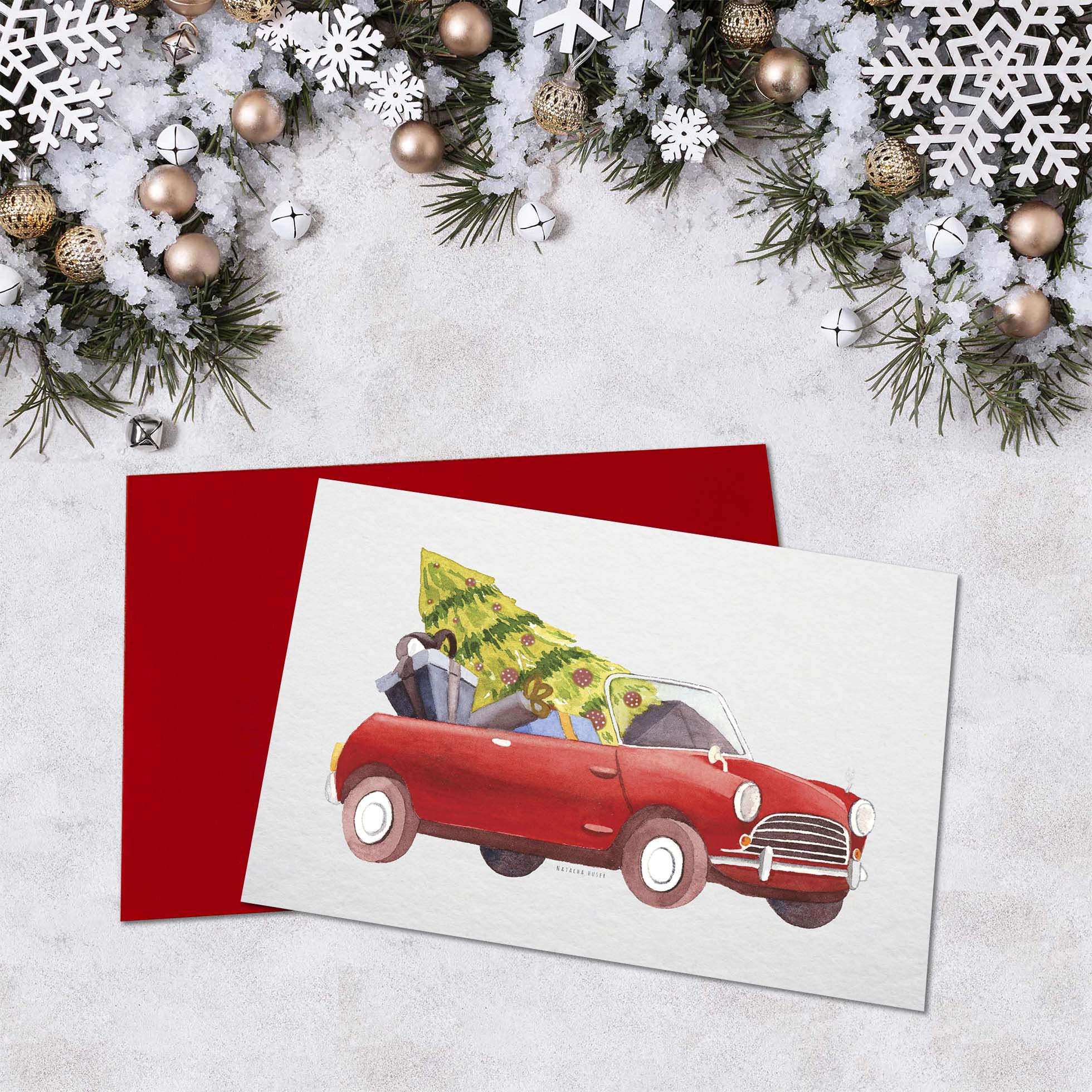 Carte de Noël représentant une mini rouge avec un sapin de Noël dans le coffre