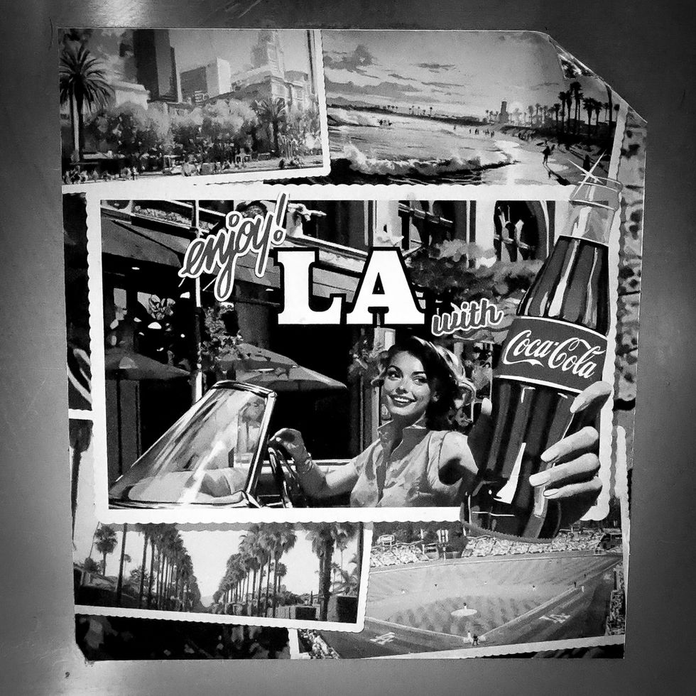 Retro-style travel montage featuring palm-lined streets and a classic convertible.
Smiling woman holding a glass soda bottle beside scenic California-inspired illustrations. Captured by Alexander Eastick.
