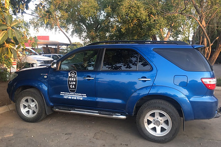 Closed vehicle for transfers and tours