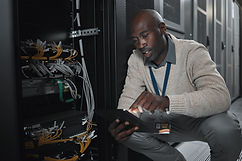 data-center-or-black-man-on-tablet-in-server-room-2025-04-06-07-10-33-utc.jpg